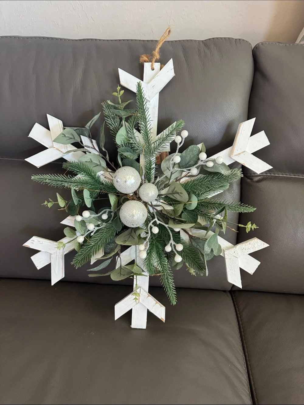 Festive White Snowflake Holiday Wall Wreath with Greenery and Lights